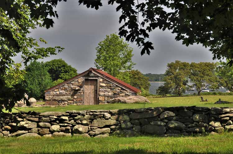 stone wall and farm building